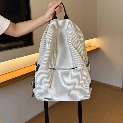 高颜值旅行轻便双肩包高级感通勤背包日常百搭简易韩系双肩书包