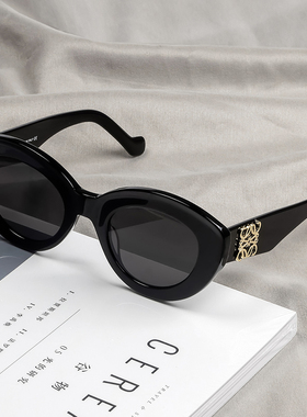 高级感明星款板材黑白色猫眼墨镜
