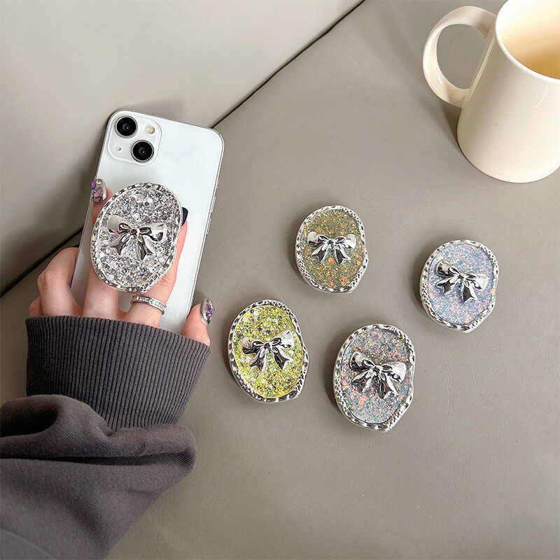 闪粉亮片蝴蝶结手机气囊支架背贴可伸缩高级感看剧支撑架便携稳固