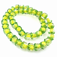 10 желто-зеленых бусин в форме тыквы диаметром 14 мм.