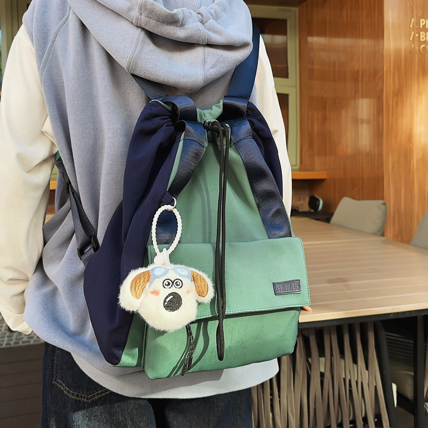 双肩抽绳包女2025新款撞色男两用背包大容量单肩包学生上课手提包