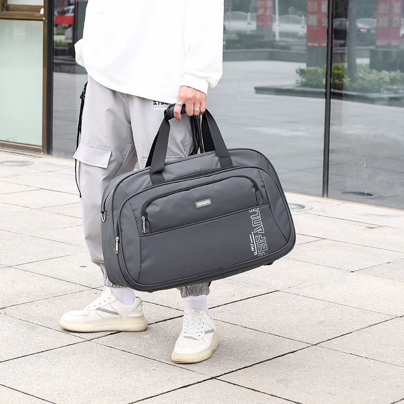 大容量手提旅行包运动户外行李袋男女时尚防水旅游包单肩装衣服包