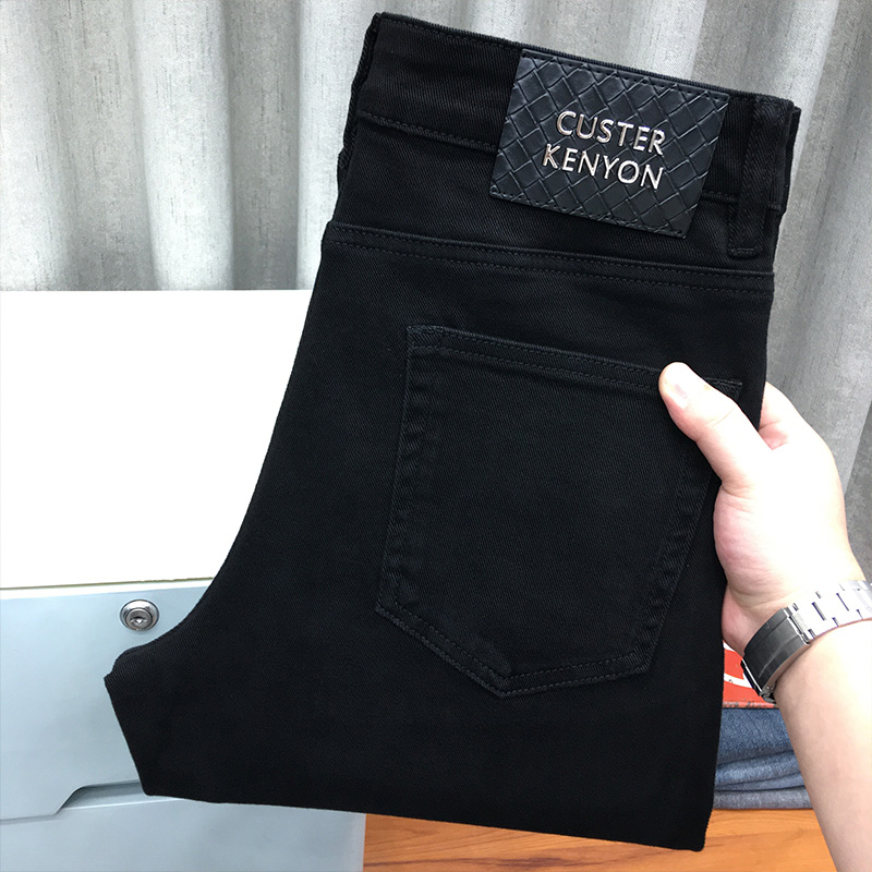 秋季黑色牛仔裤男秋冬款欧货修身小脚商务大码宽松直筒长裤纯黑色