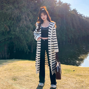 明星同款2025秋冬新款黑白条纹连帽针织开衫女慵懒风休闲毛衣外套