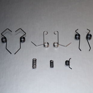 电脑横机配件大全双系统机头度目弹簧工位板复位弹簧台湾57针弹簧