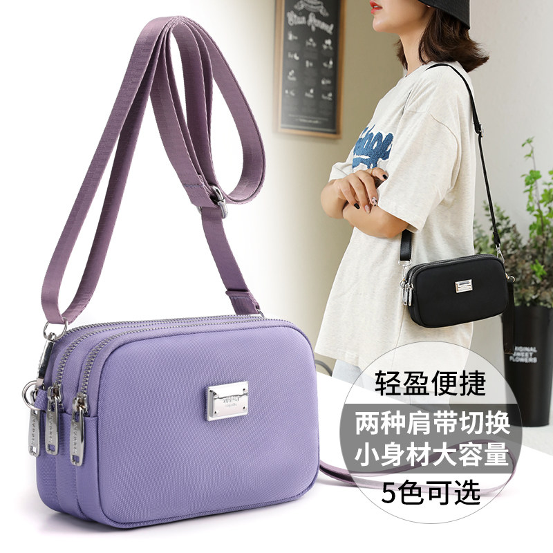 手拿包女小包2021新款帆布手机包迷你小包包手腕女士牛津布斜挎包