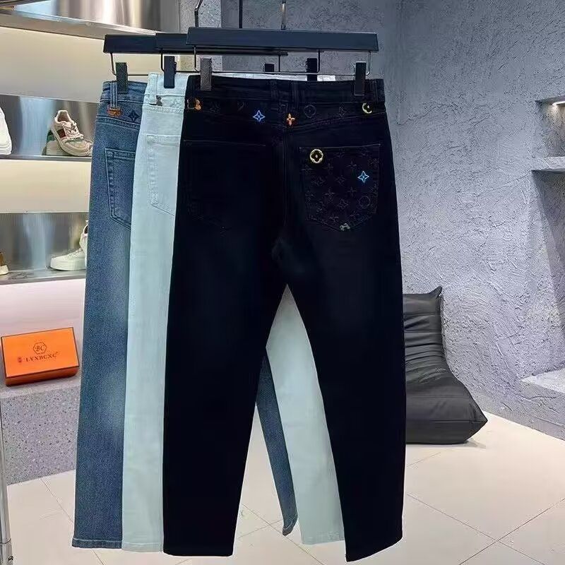秋冬新款潮牌烫钻印花修身小脚牛仔裤男韩版青年黑色流行弹力长裤