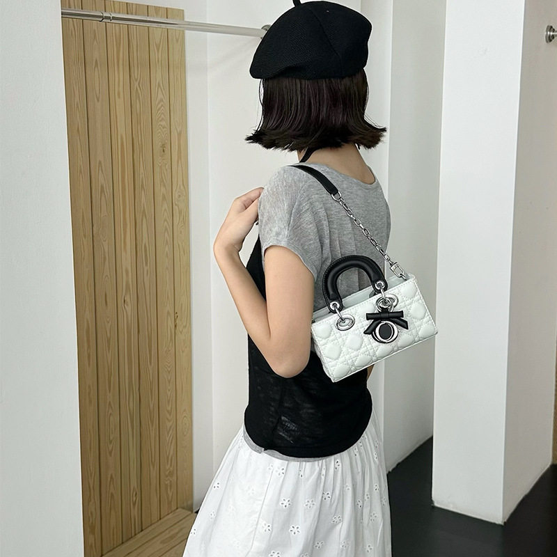羊皮蝴蝶结拼色戴妃包女2026新款气质高级感链条包手提斜挎小包包