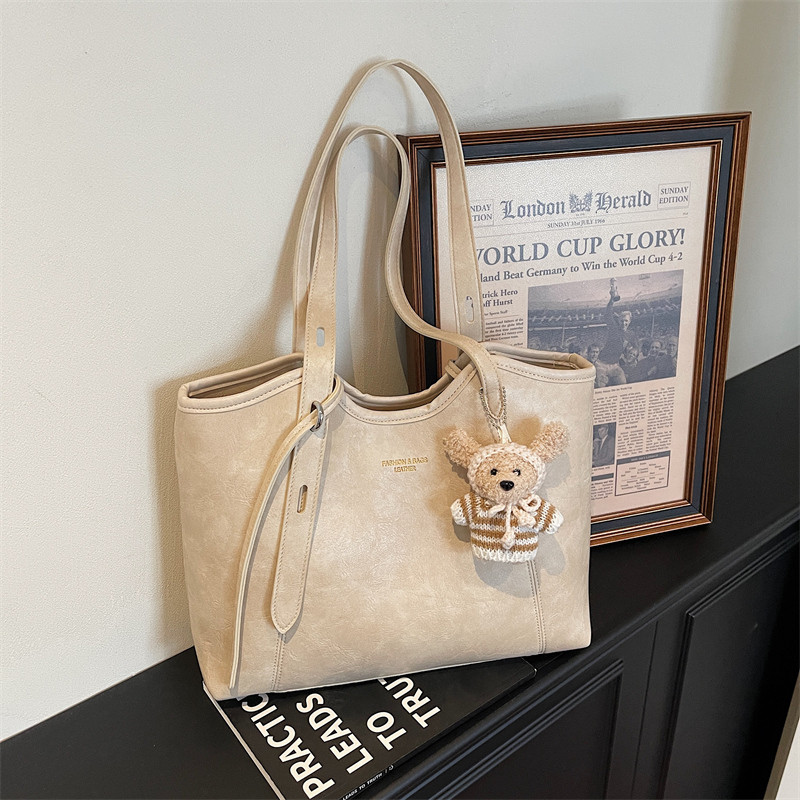 都市简约风大容量手提托特包女2026新款夏季百搭气质单肩包通勤包