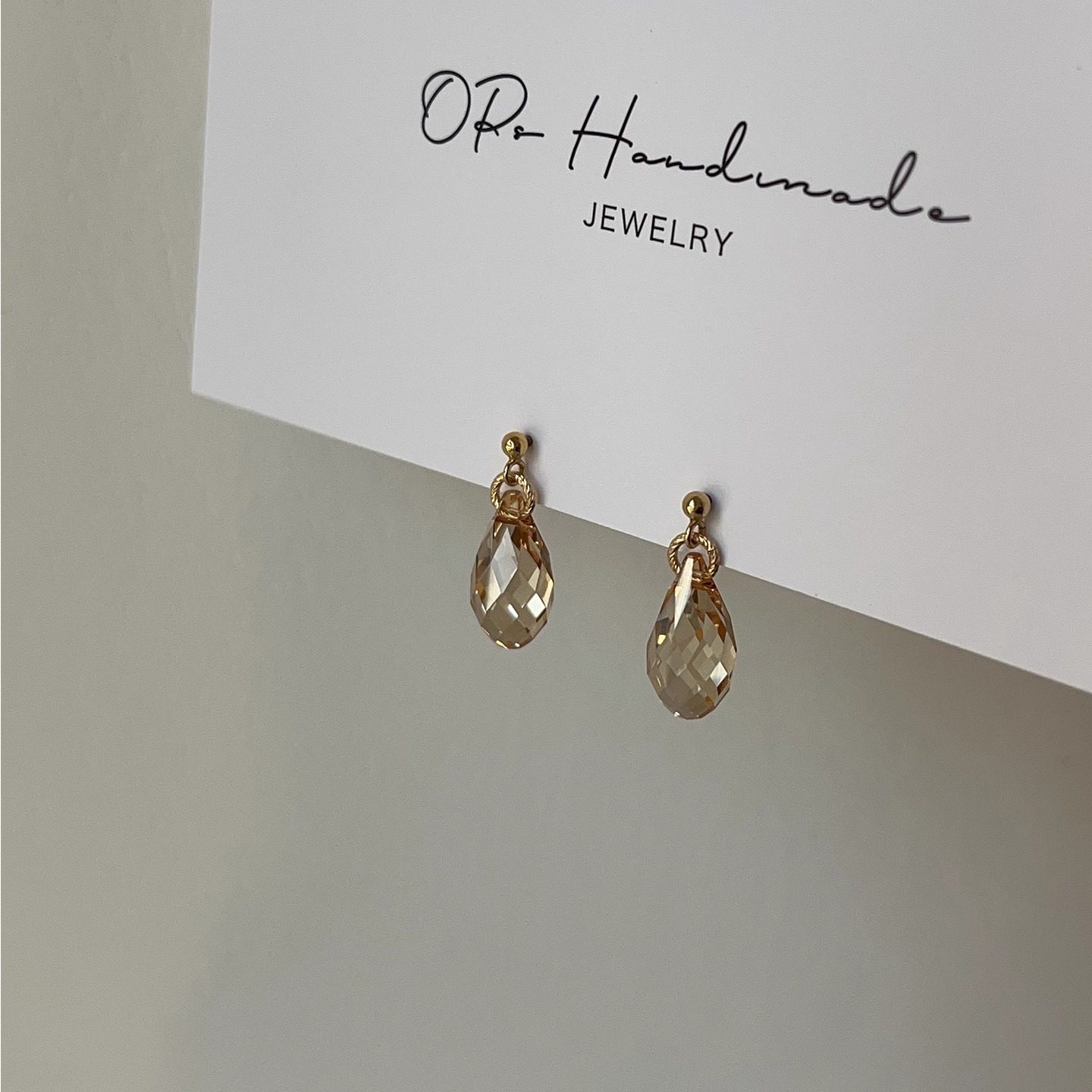 OPs金色魅影进口施家高级感浅香槟水晶美国14K包金水滴耳环/耳夹