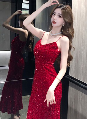 2025新年红色亮片吊带连衣裙女春装高级感修身包臀鱼尾晚礼服长裙