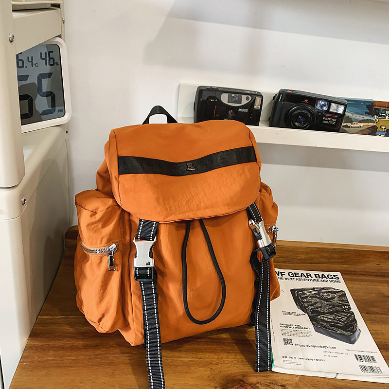 双肩包新款轻便女大容量旅游外出户外运动男工装潮流书包旅行背包