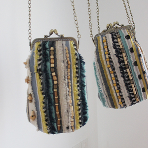 壁花壁树口金棉珠绣链条包