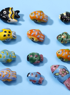 可爱趣味手绘黄色小鱼形黑色热带鱼陶瓷珠子diy项链手链饰品材料