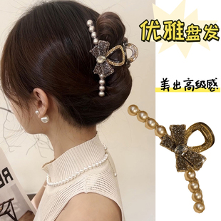 新款 轻奢砂糖仿钻蝴蝶结抓夹高级感精致百搭鲨鱼夹后脑勺盘发夹女