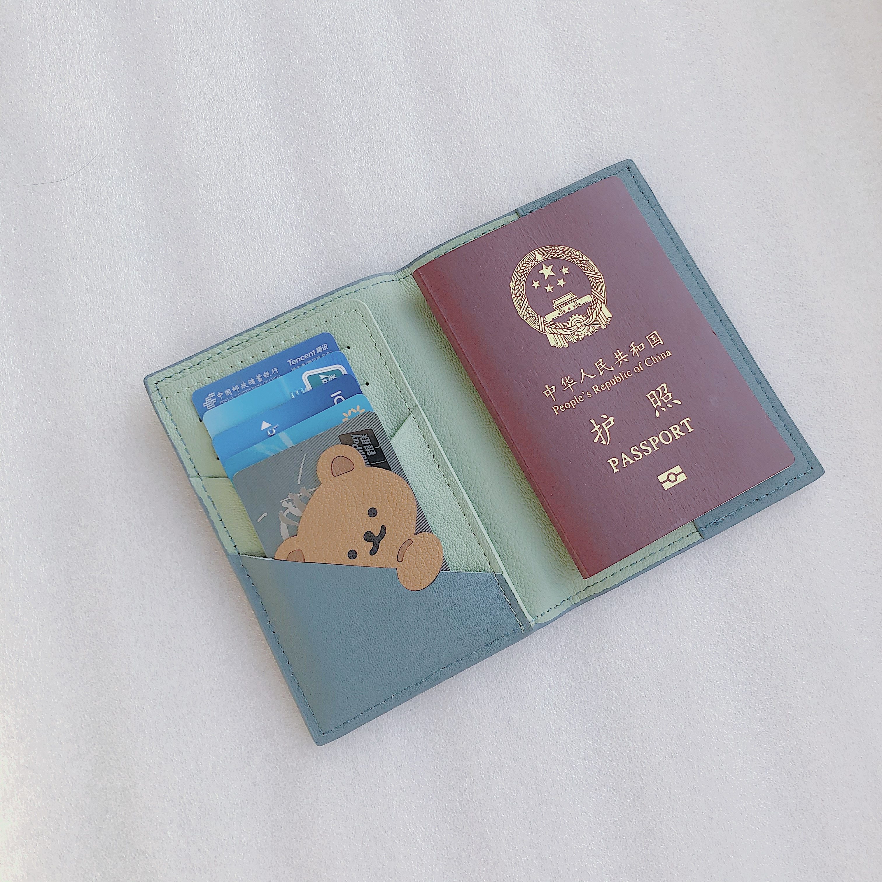 情侣手工设计旅行短款小熊护照夹头层牛皮护照包保护套证件卡包