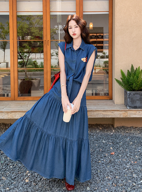 蓝色休闲时尚洋气牛仔套装女2026夏新款扭结花朵衬衫半身裙两件套