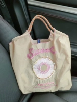 Бежевый пончик