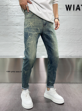 个性雷电印花做旧蓝水洗修身小脚牛仔裤男士春夏青年弹力休闲长裤