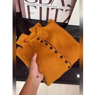 单排扣针织开衫女2025秋冬新款长袖立领橙色设计感减龄大码上衣