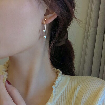 仿珍珠流苏耳环2025新款爆款轻奢高级感耳钉独特蚊香盘耳夹无耳洞