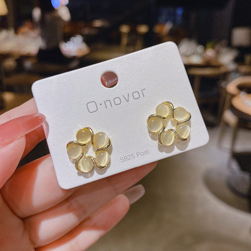 925银针2021新品超仙猫眼石螺旋花朵耳钉女款日韩简约耳饰品耳环