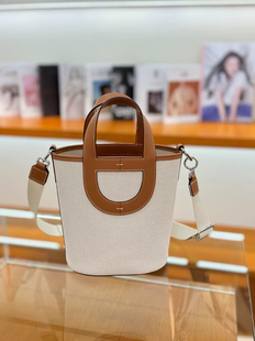 帆布拼皮小众新款猪鼻子菜篮子女包高级感手提斜挎真皮轻便水桶包