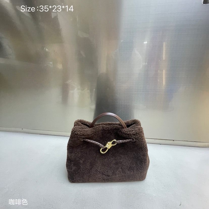 2025秋冬新款羊羔毛编织蝴蝶扣手提包时尚简约大容量单肩斜挎女包
