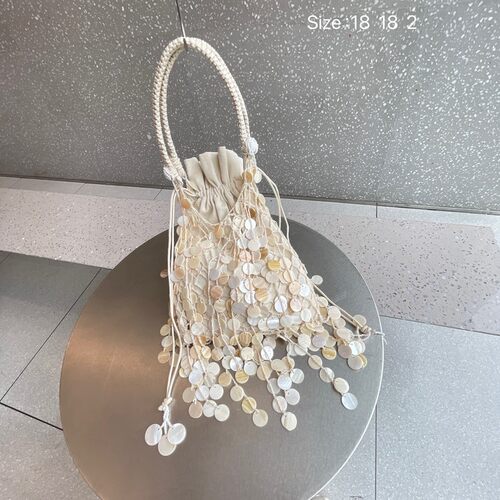 2026新品网红小众设计仙女慵懒贝壳流苏包晚宴包手提手机包子母包