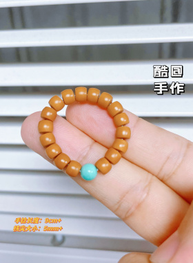 橄榄核尖国产材质复古指尖文玩药片 迷你型小手捻百香把玩把件