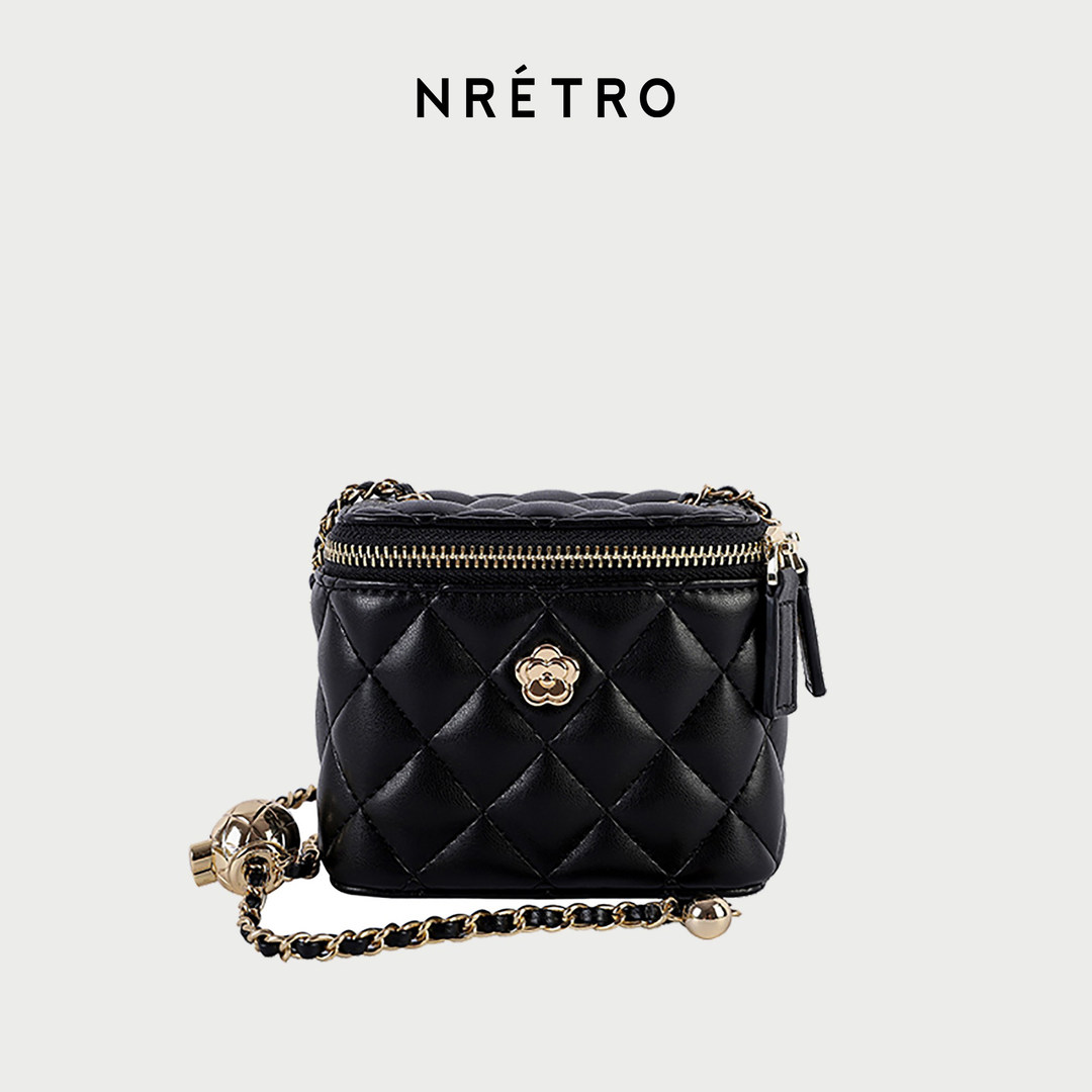 Black quilted chain-strap handbag with gold hardware