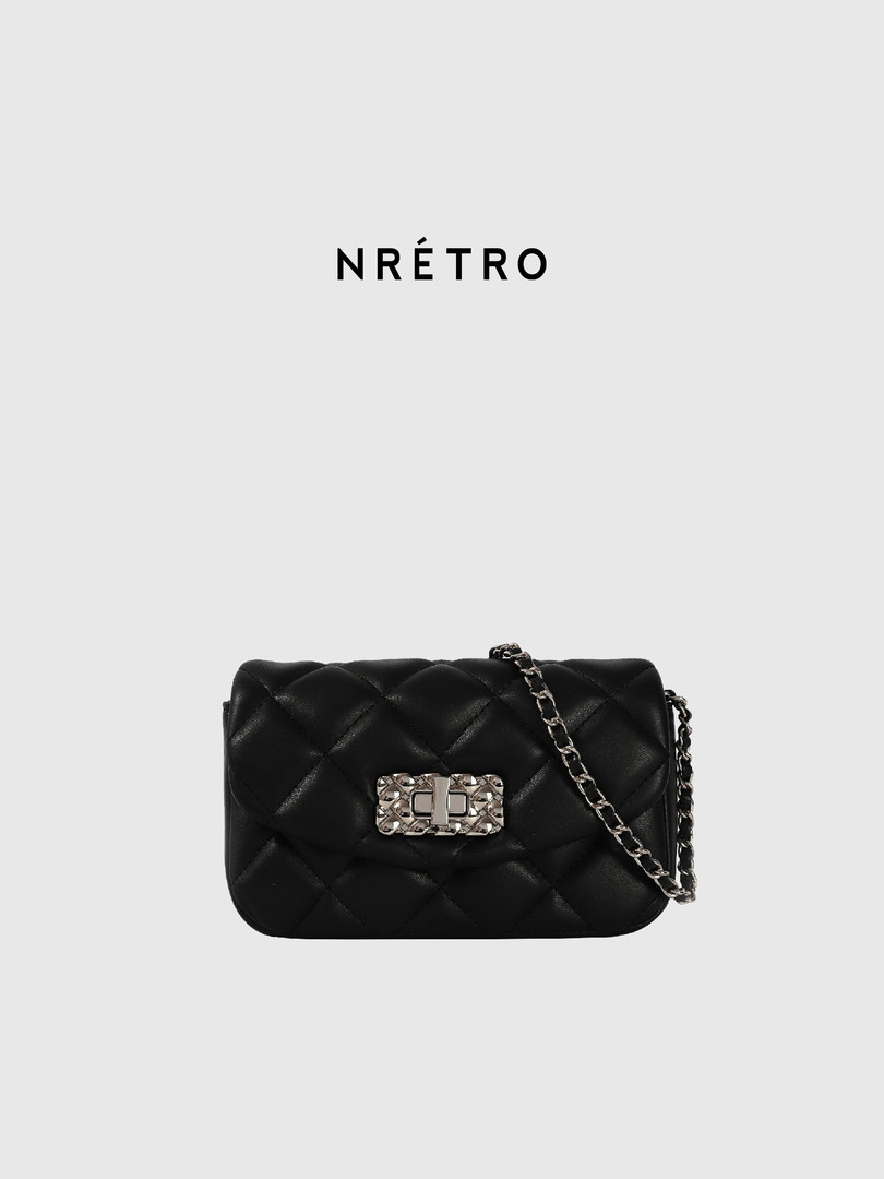 Black quilted chain-strap handbag with silver clasp on a white background