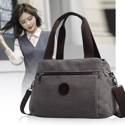 新款韩国多隔层休闲风轻便小布包