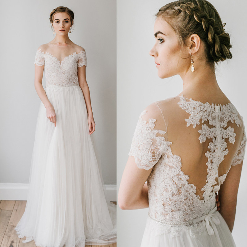 新款短袖一字肩蕾丝飘逸森系超仙新娘户外草坪婚礼纱旅拍海滩轻纱