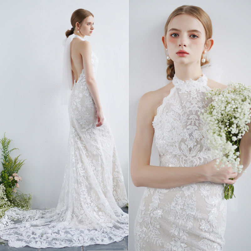 优罗莎原创实拍优雅挂脖蕾丝鱼尾露背性感气质新娘婚纱户外草坪纱