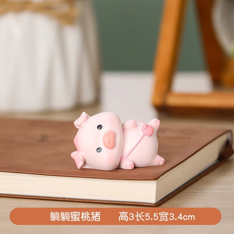 办公桌面装饰可爱萌宠滴答雨衣小猪树脂工艺品摆件新款卡通公仔女
