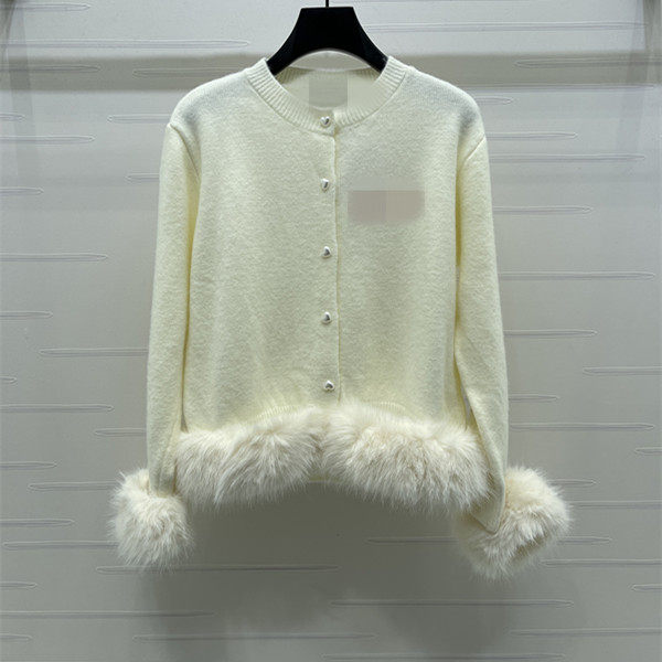 2026早春新品圆领单排扣下摆毛毛气质百搭针织衫,女装/女士精品,毛针织衫,淘宝优惠券,粉丝福利购,淘宝优惠卷