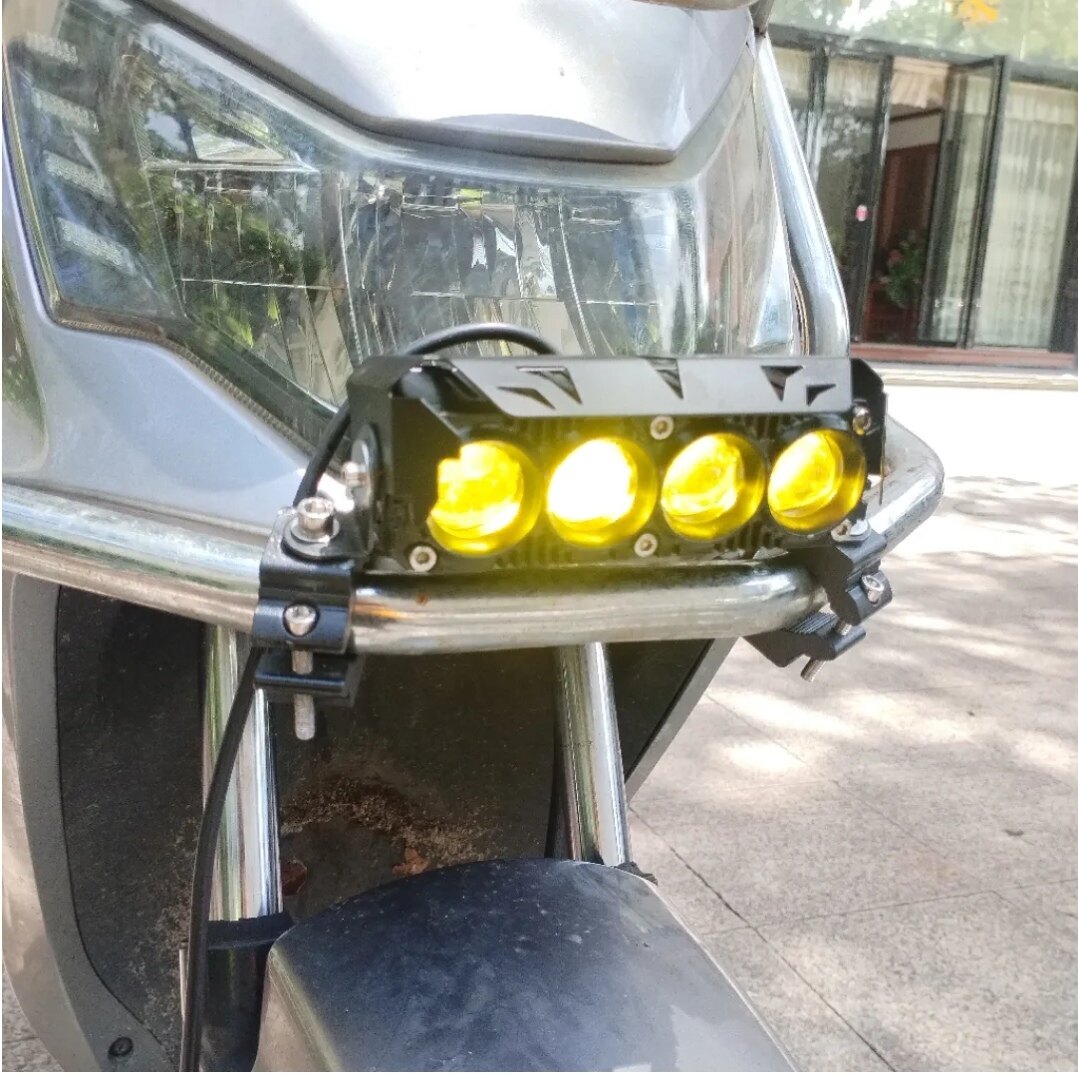 新款摩托车灯超亮电动车射灯中网灯外置铺路减震安装灯护杠安装灯