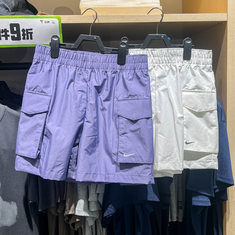 NIKE耐克女裤2025夏新款宽松高腰梭织工装运动短裤HM6983-133-527