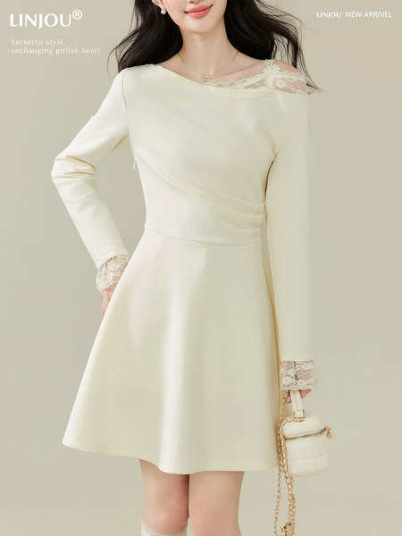 Cream long-sleeve lace-trim dress worn by a model