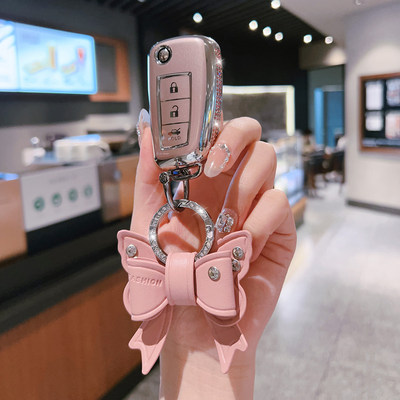 适用于日产轩逸经典钥匙套尼桑折叠骐达车逍客劲客蓝鸟壳奇骏女扣