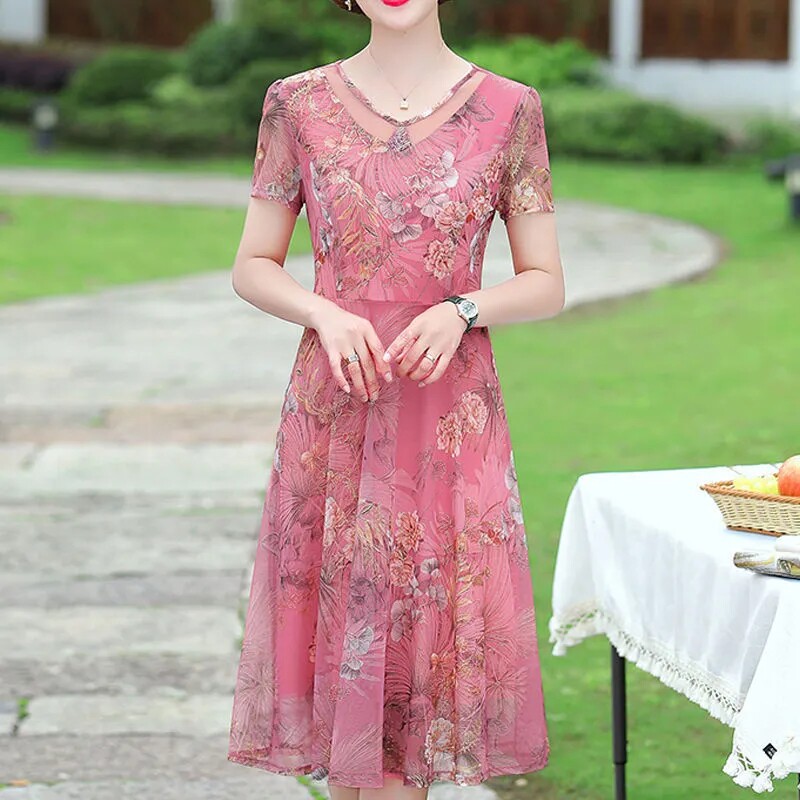 中老年夏季薄款连衣裙女中长款时尚妈妈阔太太过膝透气裙子高贵