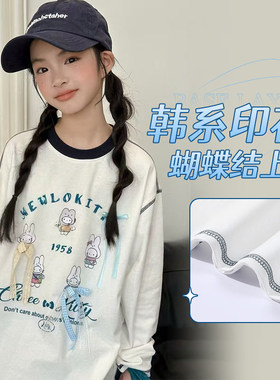 熙爱2026女童秋装长T纯棉吸汗韩系卡通印花蝴蝶结洋气上衣圆领
