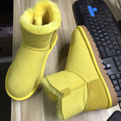 雪地靴羊皮毛一体柠檬黄牛筋底