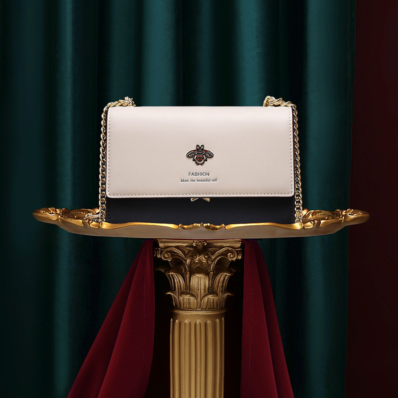 卡丹路官方旗舰店蜘蛛王昆仑奴女包斜挎包时尚真皮链条包单肩小包