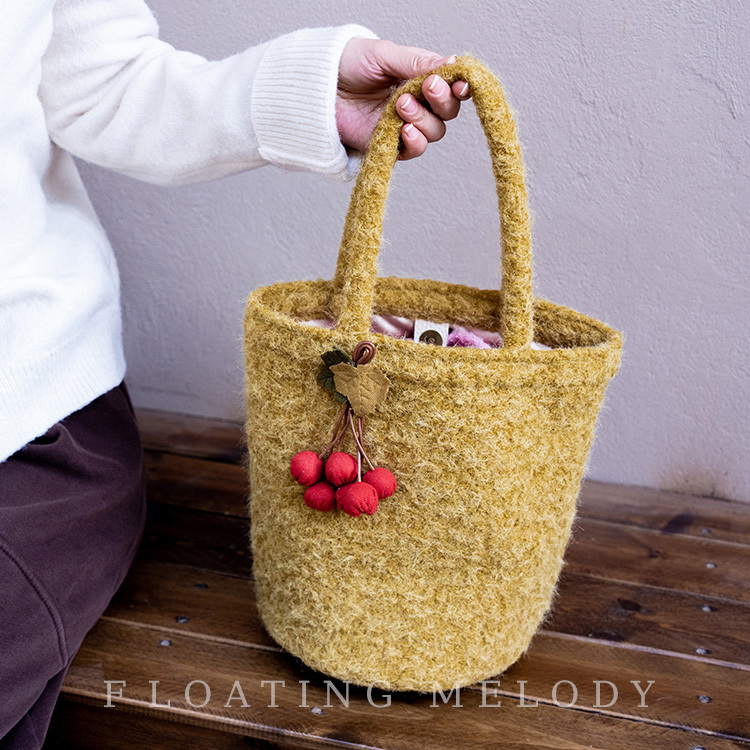 原创复古姜黄色手拎水桶包