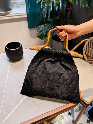 原创新中式黑色竹节手提包配旗袍