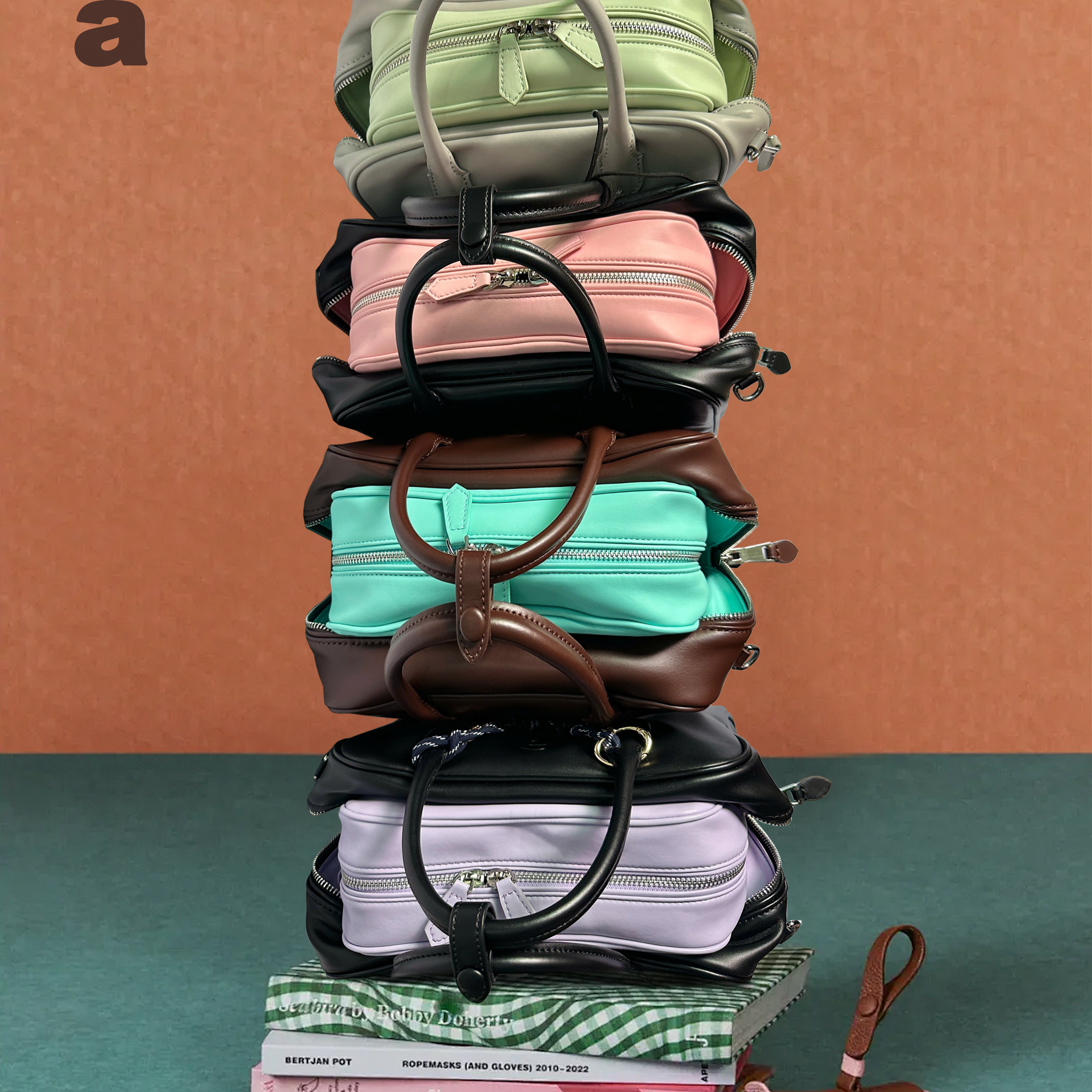 aaip撞色子母包斜挎波士顿包