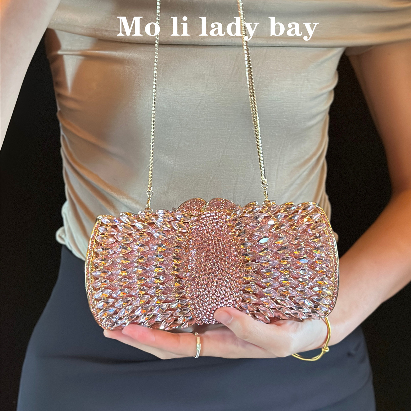 【高货】高级粉金闪闪的水滴钻石参加婚礼晚宴包水晶烫钻女晚装包图片