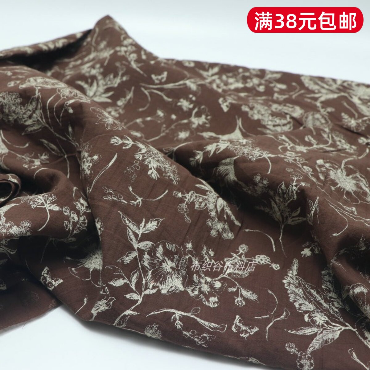咖色印花朵稍薄棉麻服装布料图片